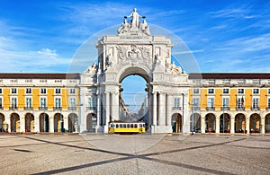Praca do Comercio with yellow tram, Lisbon, Portugal photo
