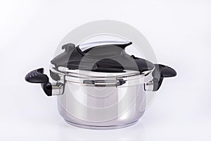 Practical silver pressure cooker on neutral background