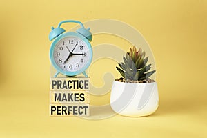 Practice makes perfect - Motivational Reminder on Wooden Blocks