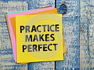 Practice makes perfect, text words typography written on paper, life and business motivational inspirational
