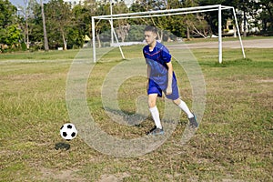 Practicing of little football player