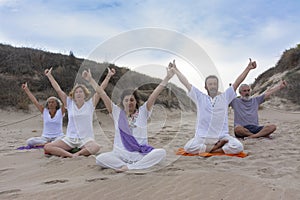 Practicing yoga on the beach