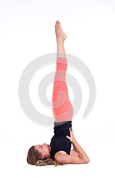 Practicing Yoga exercises / Shoulderstand - Sarvangasana - Viparita Karani