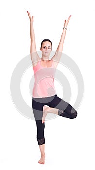 Practicing Yoga exercises / Tree Pose - Vrksasana