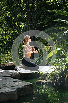 practicing yoga in tropic environment
