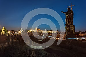 Prague Castle and Charles Bridge in the evening, Prague, Czech Republic, Vltava river in foreground