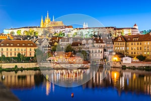 Prague Castle, Czech: Prazsky hrad. Illuminated landmark by night. Vew from Charles Bridge, Praha, Czech Republic