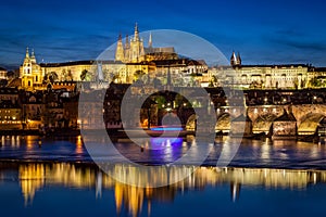 Prague Castle, Hradcany reflecting in Vltava river in Prague, Czech Republic at night