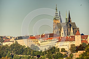 Prague cityscape with historic cityscape (Hradcany area) and the Prague castle during the morning sunrise