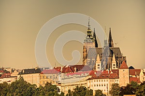 Prague cityscape with historic cityscape (Hradcany area) and the Prague castle during the morning sunrise