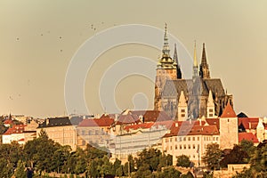 Prague cityscape with historic cityscape (Hradcany area) and the Prague castle during the morning sunrise