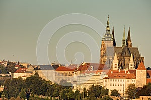 Prague cityscape with historic cityscape (Hradcany area) and the Prague castle during the morning sunrise