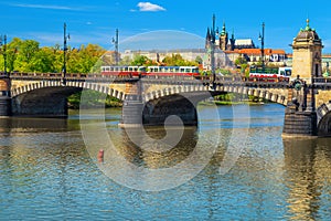 Prague cityscape with stone bridge and Vltava river, Czech Republic