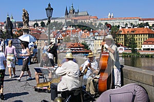 PRAGUE, CZECH - JULY 30, 2007 - Street jazz musicians play dixieland music on the Charles Bridge across the Vltava River