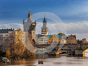 Prague, Czech Republic - Beautiful golden sunset and blue sky at the world famous Charles Bridge Karluv most
