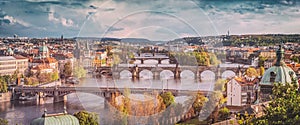 Prague, Czech Republic bridges skyline with historic Charles Bridge and Vltava river. Vintage