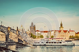 Prague, Czech Republic. Charles Bridge, boat cruise on Vltava river. Vintage