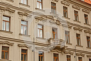 Prague, Czech Republic. 10.05.2019: Close-up view of the facade with windows of old historical buildings in Prague. Retro, old-