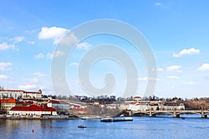 Prague, Czech Republic - Cruise boat on the Vltava river in the center of Prague. embankment of prague