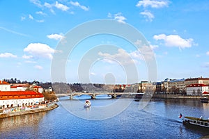 Prague, Czech Republic - Cruise boat on the Vltava river in the center of Prague. embankment of prague