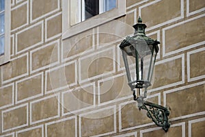 PRAGUE, CZECH REPUBLIC/EUROPE - SEPTEMBER 24 : Old fashioned street lamp on a building in Prague on September 24, 2014