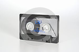 PRAGUE, CZECH REPUBLIC - FEBRUARY 20, 2019: Audio compact cassette Sony UX chrome 90 view from right. Audio cassette on a white