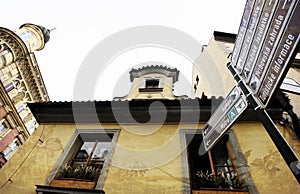 Prague, Czech Republic - January 27, 2014: Tourist attractions pointers. angle from the bottom