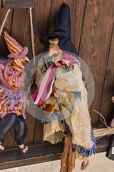 Witch marionette doll in Prague, Czech Republic, Halloween background