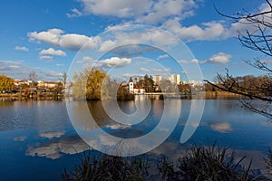 View of the Hamersky pond and blue sky in water