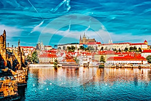 PRAGUE,CZECH REPUBLIC- SEPTEMBER 13, 2015: View of Prague Castle from waterfront- famous historic bridge that crosses the Vltava