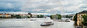 Prague, Czech Republic skyline with historic Charles Bridge. Boat cruise on Vltava river