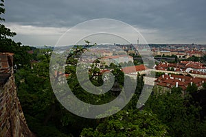 Prague, Czech Republic: Top view to red roofs skyline of Prague city, Czech Republic. Aerial view of Prague city with terracotta