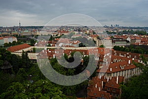 Prague, Czech Republic: Top view to red roofs skyline of Prague city, Czech Republic. Aerial view of Prague city with terracotta