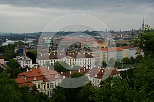 Prague, Czech Republic: Top view to red roofs skyline of Prague city, Czech Republic. Aerial view of Prague city with terracotta