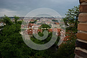 Prague, Czech Republic: Top view to red roofs skyline of Prague city, Czech Republic. Aerial view of Prague city with terracotta