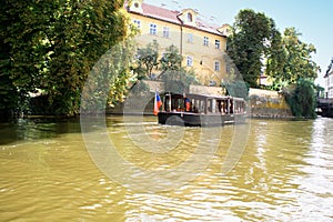 Prague, Czech Republic with turist boat and Vltava river