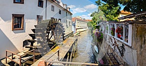Velkoprevorsky Watermill - mill wheel on the Vltava River, water canal Certovka, Prague, Czech Republic