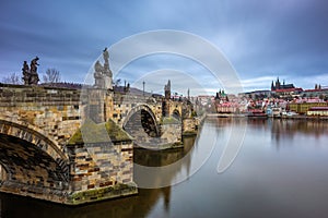 Prague, Czech Republic - The world famous Charles Bridge Karluv most with River Vltava and St. Vitus Cathedral photo