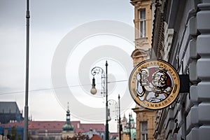 Gambrinus logo in front of a local retailer bar in Prague.