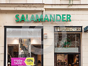 Salamander shoes logo in front of their store in Prague.