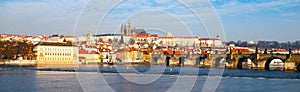 Prague Hradcany Panorama on sunny day. Charles Bridge over Vltava River with Prague Castle, Czech Republic