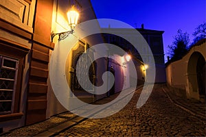 Old lanterns illuminating a dark alleyway