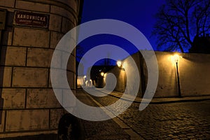 Old lanterns illuminating a dark alleyway