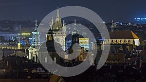 Prague night timelapse, fantastic old town roofs during twilight with towers and night illumination, Czech Republic