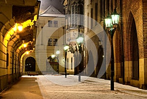 Prague Old Town street with university building at