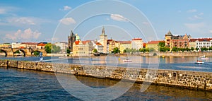 Prague Old Town towers with Charles Bridge over Vltava river