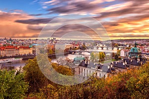 Prague, panoramic view to the historical bridges, old town and Vltava river from popular view point in Letna park, Czech Republic