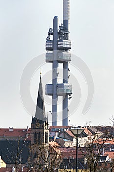 Prague skyline with Zizkov television tower transmitter and Church of Saint Procopius, Czech Republic