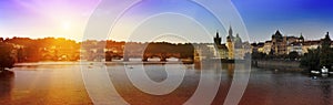 Prague - Vltava Embankment and Charles Bridge, the Czech Republic. Sunset