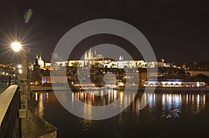 Prague, Vltava river, Hradcany castle, Czech republic - view from Charle`s bridge, night scene